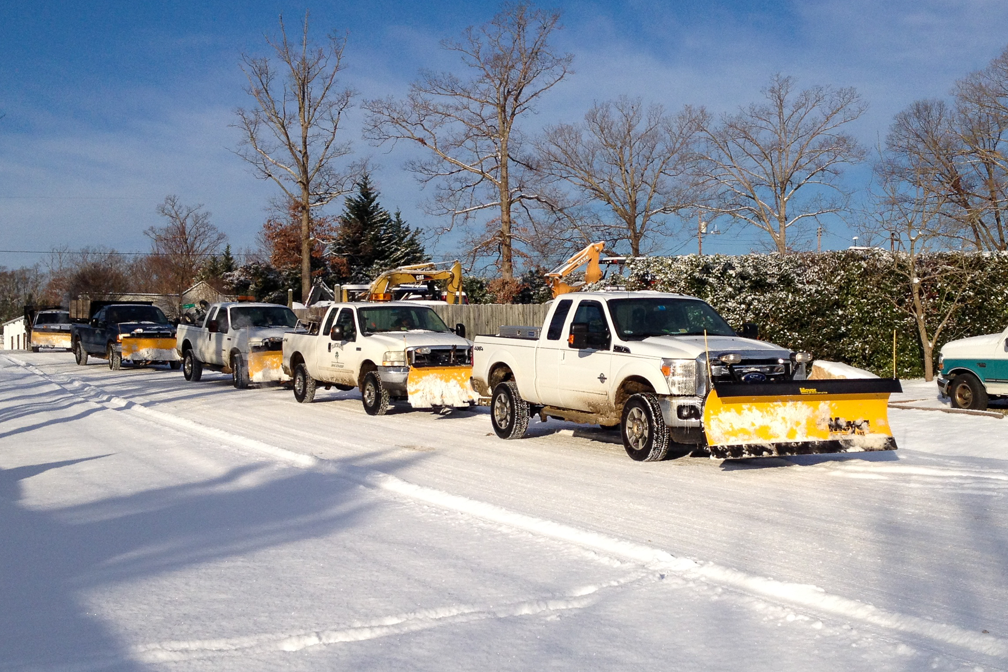 Plantscapes snow removal trucks at work